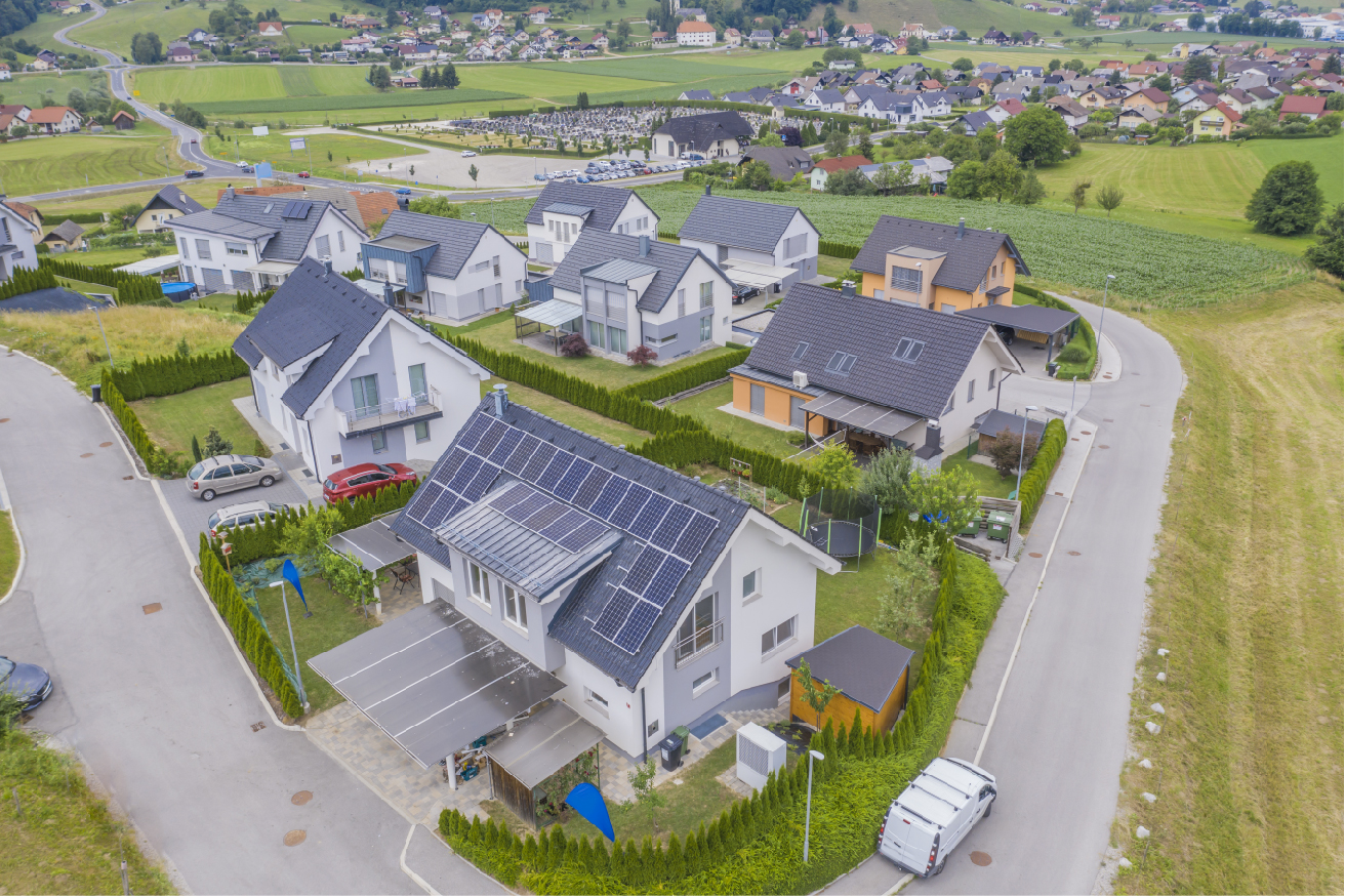 aerial view private houses with solar panels roofs 01